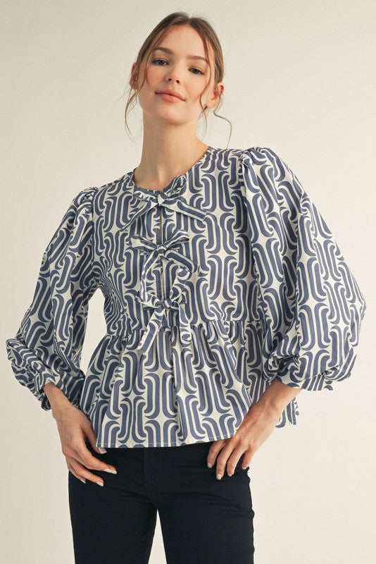 Bow Tie Detail Geo Peplum Top | Denim Blue
